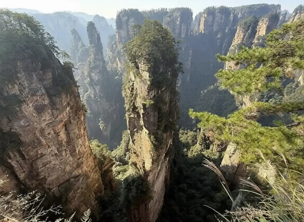 wulingyuan zhangjiajie hunan china:Tall isolated sandstone peak in Zhangjiajie National Park-ezremove