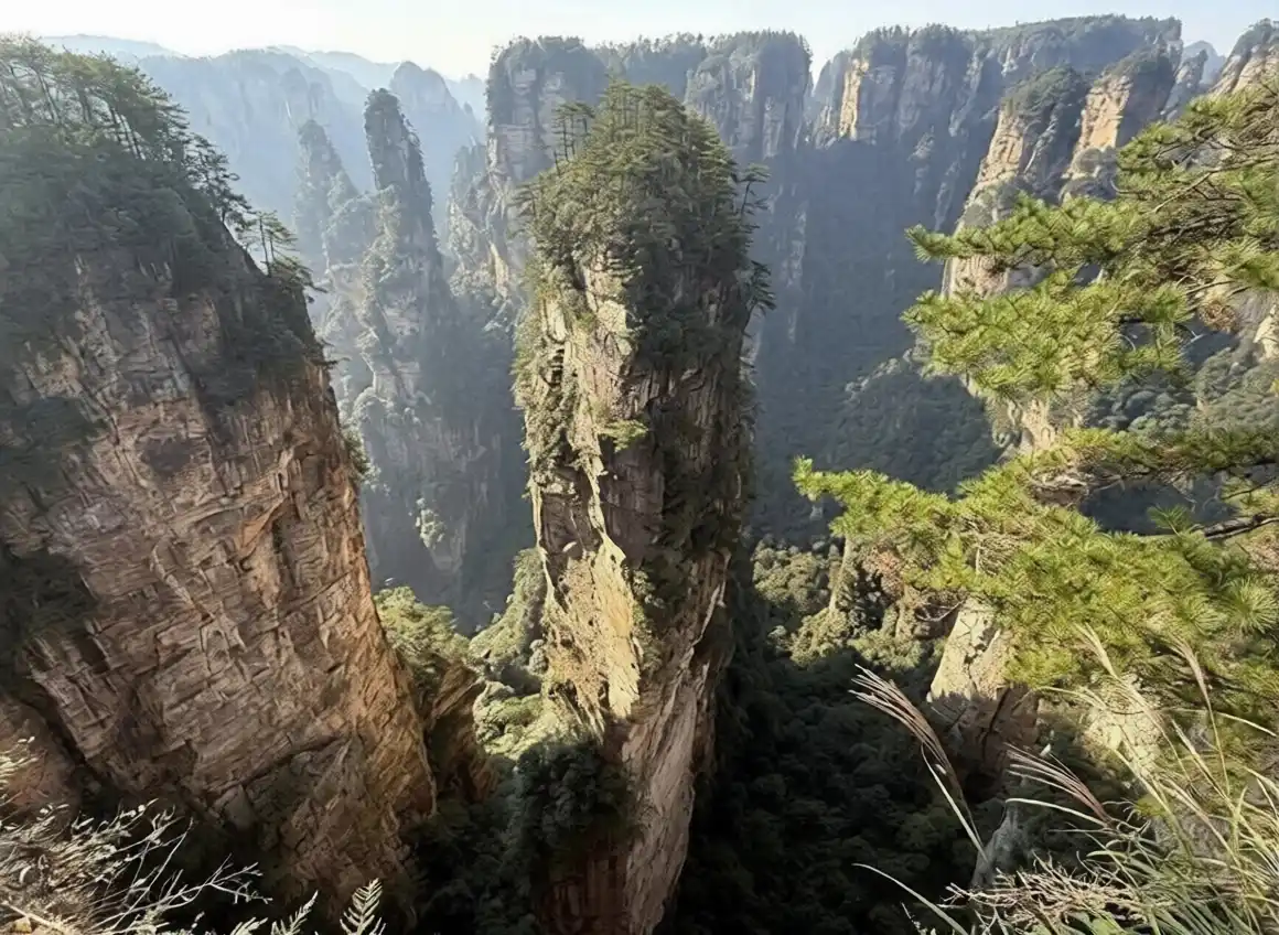 Tall isolated sandstone peak in Zhangjiajie National Park-ezremove