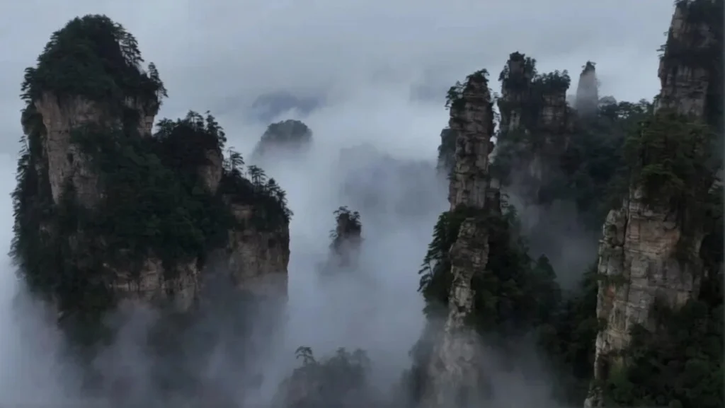 Dramatic cloud sea in Wulingyuan area showing why it's the best time to zhangjiajie for fog lovers