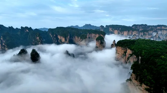 Panoramic sunrise view of sandstone pillars at Zhangjiajie National Forest Park best time to visit
