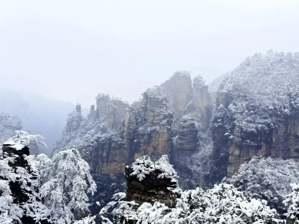 Snow covered peaks in Zhangjiajie National Park during the quiet best time of year to visit Zhangjiajie