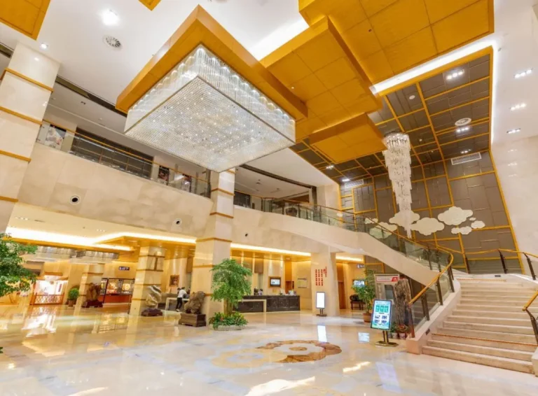 Huatian Hotel Zhangjiajie lobby with crystal chandelier and marble columns